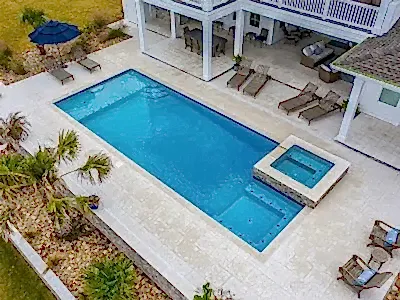 Lux Project 9 featuring a custom rectangular pool and spa