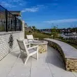 Lux Project 8 custom fireplace with a built-in bench