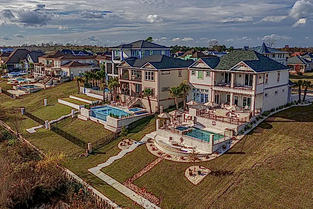 Lux Project 8 custom pool and spa situated in an urban setting beside a serene lake