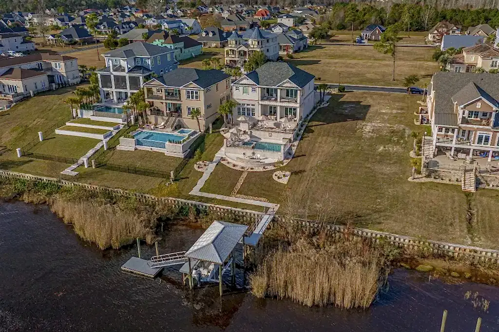 Lux Project 8 custom pool and spa situated in an urban setting beside a serene lake