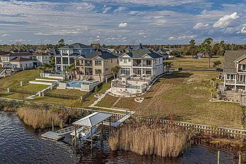 Lux Project 8 custom pool and spa situated in an urban setting beside a serene lake