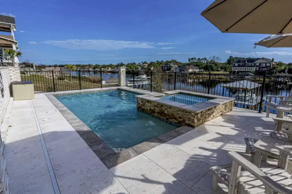 Lux Project 10 custom rectangular pool and spa with waterfall feature