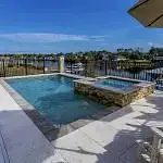 Lux Project 10 custom rectangular pool and spa with waterfall feature