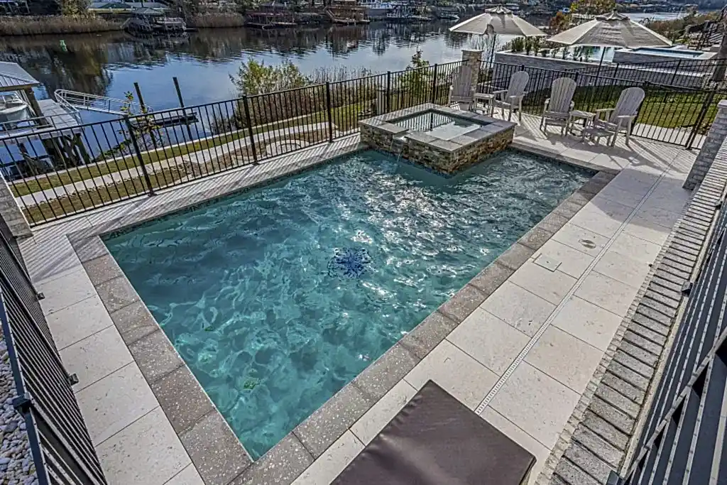 Lux Project 10 custom rectangular pool and spa with waterfall feature