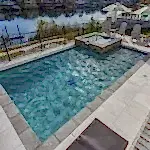 Lux Project 10 custom rectangular pool and spa with waterfall feature